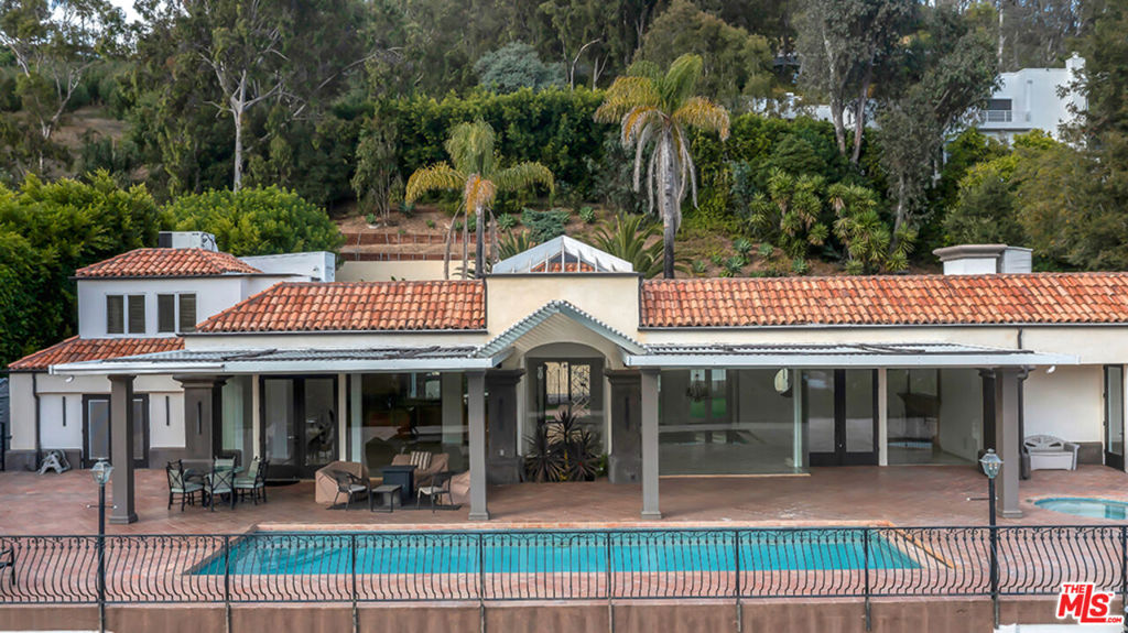 10557 Rocca Place — architectural residence