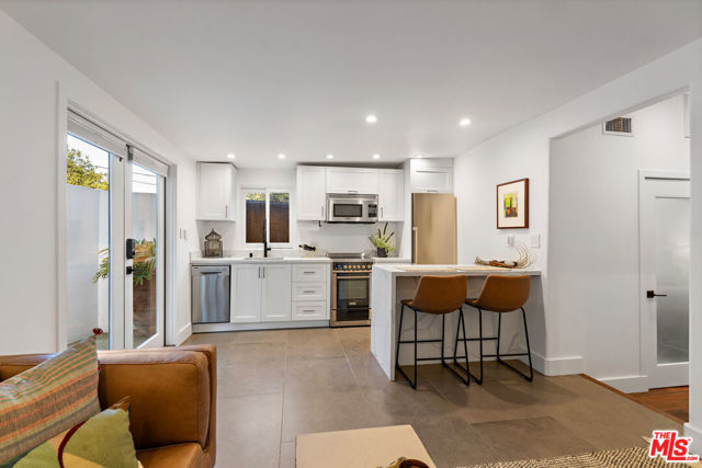 8701 Wonderland Park Avenue, Los Angeles CA: https://media.crmls.org/mediaz/e545b40e-b800-4ea3-bb7a-7a642fa1fe94.jpg