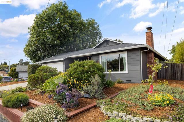 Ranch-style house with a chimney, a garage, and crawl space
