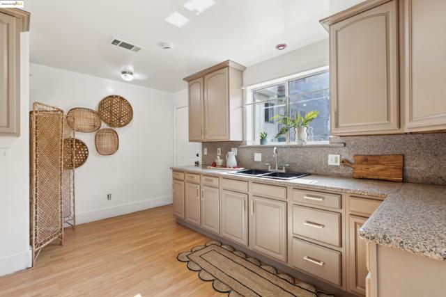 3064 E 15Th St, Oakland CA: https://media.crmls.org/mediaz/e5ee390a-1831-4679-a9ab-c75a59d92bf1.jpg