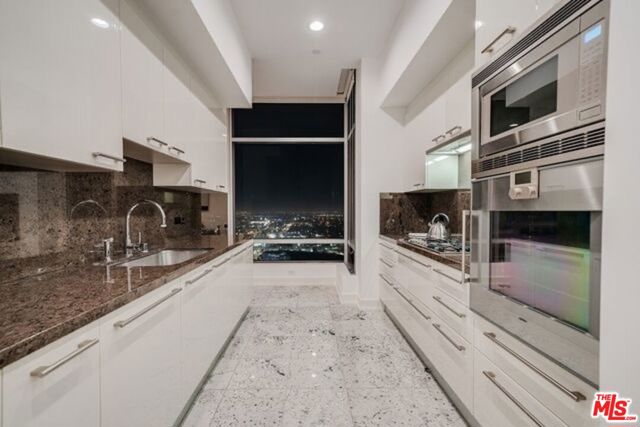 900 W Olympic Boulevard, Los Angeles CA: https://media.crmls.org/mediaz/e62f5742-102d-41a3-8798-f1092f7c8b91.jpg