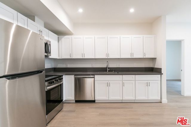 1227 N Berendo Street, Los Angeles CA: https://media.crmls.org/mediaz/e6a36fe3-39c3-4339-8860-c811c5aa3b72.jpg