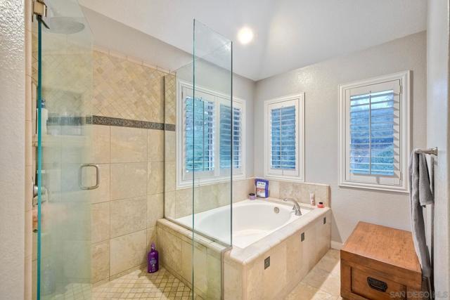 Separate soaking tub for a luxurious spa experience!