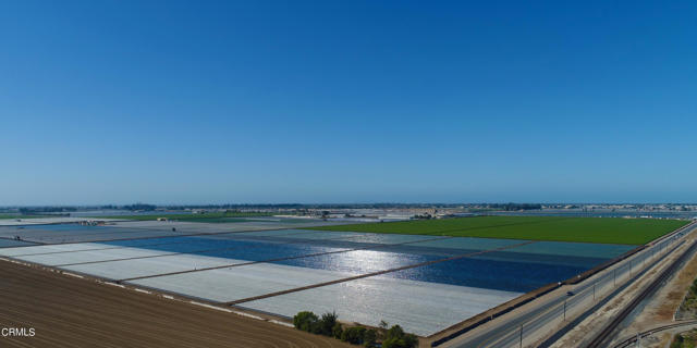161+/- Acres of Prime Farmland  on the Oxnard Plain - Strawberry & Vegetable Row Crop Land for sale. Located at the SEC of Rice Ave. & East 5th St., Oxnard.  Water Sources: 2 Private Wells (1 well pumping 900-1300 GPM & a 2nd Standby Well), plus United Water Conservation District Connection.  Level Topography.  MOG Rights owned Separately.  Sale is subject to a Farm Lease with an Excellent Tenant and a 1- year Termination Clause.  15+/- Acs subject to Caltrans Rice Ave Grade Separation Project.  Located across the street from the Oxnard City Limits & CURB (city urban restriction boundary).  Zoned AE 40 Acre Minimum & Subject to Ventura County SOAR.  Convenient to Farm Worker Housing and Packing Plants.