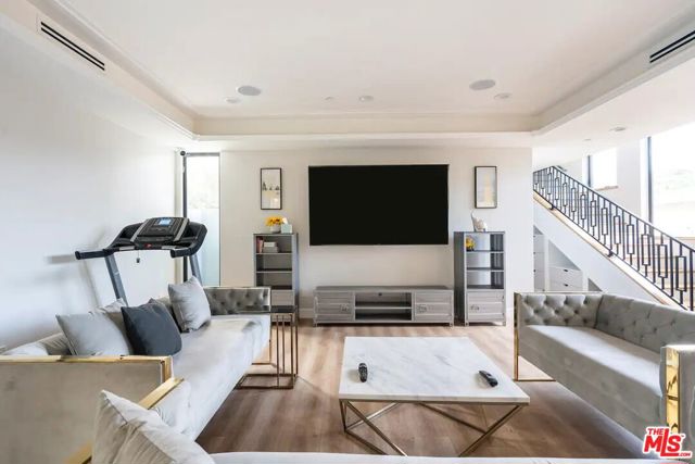 Spacious living room with plenty of seating area