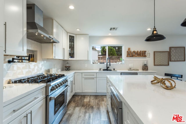 23320 Bassett Street, West Hills CA: https://media.crmls.org/mediaz/e8aa0685-b0b4-4230-bc7e-2ce7a6db81ec.jpg