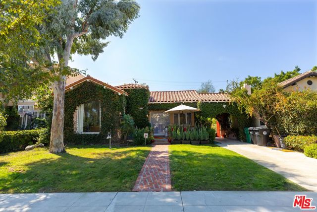 Gorgeous 1920s Spanish style home located on a peaceful street in Beverly Hills. This home is over 2,000 sf with 4 bedrooms and 2 bathrooms. Spacious living room is adorned with high ceilings, a fireplace and a large dramatic picture window. Hallway has a skylight which brings in an abundance of natural light. Laundry room has washer, dryer, and plenty of cabinets for storage. Backyard has plenty of space to entertain guests or have children play. Walking distance to Hamel Mini Park and Horace Mann Elementary School. Close proximity to shopping, dining, markets and many other local businesses. Driveway and 2 car garage parking on the property. Fully furnished (if needed) and move-in ready.