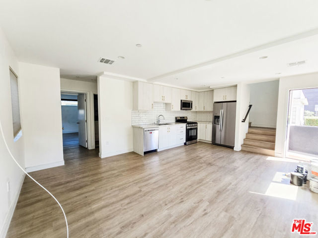 3524 S Bronson Avenue, Los Angeles CA: https://media.crmls.org/mediaz/e943dcb1-1e29-4b7c-ae2c-5c2e909f34f0.jpg