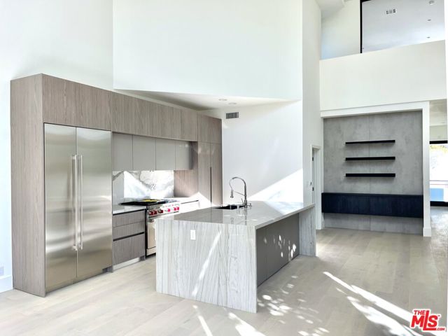 822 Pacific Avenue Venice, California Ready to elevate your lifestyle in the iconic Venice Beach? Here's a rare opportunity for you to experience a unique residence that's been renovated right off of Abbot Kinney Blvd, GQ Magazine's "Coolest Street in America" and one block from the iconic Venice Beach. Built by famous contemporary artist Martha Alf, this breathtaking home has been completely renovated and is ready for your arrival. Every corner of the remarkable open floor plan is bathed in natural light that floods through an expansive array of windows. Upstairs, there are 2 en-suite bedrooms while thirty-foot ceilings soar above the sun-drenched living room to showcase your artwork. The stunning chef's kitchen features Wolf appliances, Sub Zero refrigerator, and a gorgeous marble island. On the ground floor, you'll have a 1 bedroom ADU with a separate entrance featuring a beautiful kitchen, generously sized walk-in closet and a soaking tub & shower in its stunning bathroom. Glass sliders and accordion doors lead to the inviting escape that is your enclosed private patio and front yard. Enjoy some of the best restaurants and shops LA has to offer and the iconic Venice Beach when you make this incredible, ultra-modern residence your haven. As a premium perk, you'll have an attached 2-car garage plus parking for 2 additional cars so you'll never worry about parking and laundry in both the upstairs and downstairs ADU. This is the superior lifestyle most people only dream of. This lease is for the entire property, however the top floor and bottom ADU can be leased separately and unfurnished for less. Come take a tour while it's still available!