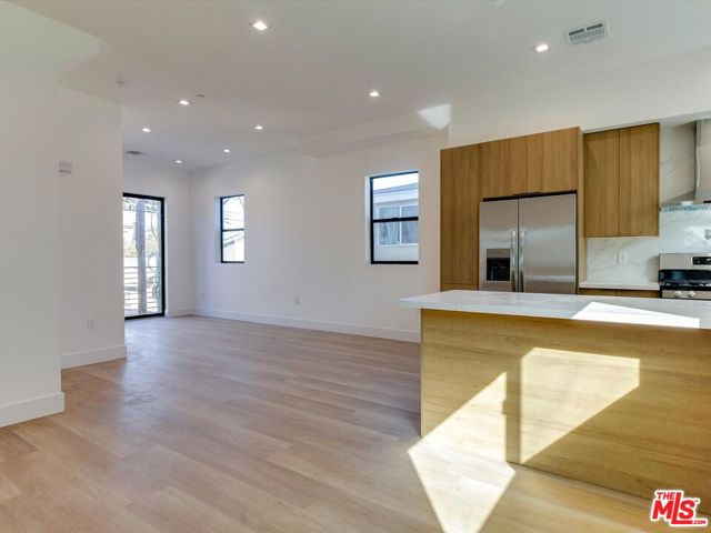 2817 S Redondo Boulevard, Los Angeles CA: https://media.crmls.org/mediaz/ea7e7609-3cda-4e41-a95b-24ac7b16560a.jpg