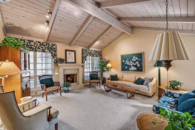 Livingroom w/ wood vaulted ceilings