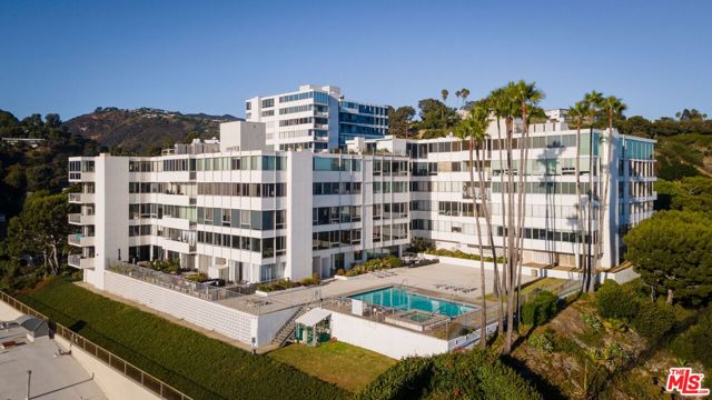 Situated right where Pacific Palisades meets Malibu, this lovely penthouse delivers dramatic ocean views in an enviable location. Floor to ceiling glass windows capture the beauty of our Southern California coastline. The open Floor plan features a chef's kitchen, granite countertops, stainless steel built-in appliances and a tastefully updated bathroom and the unit comes with 2 parking spots.  The complex, Edgewater Towers, is a gated complex with 24 hour guards.  The 9 acre property features 2 pools, tennis court, gazebo area with BBQs, gym, recreation room and hiking trails with peaceful & stunning ocean vistas/gardens.  This is a rarified and lovely location, a great place to call home be it full-time or as a pied-a-terre.