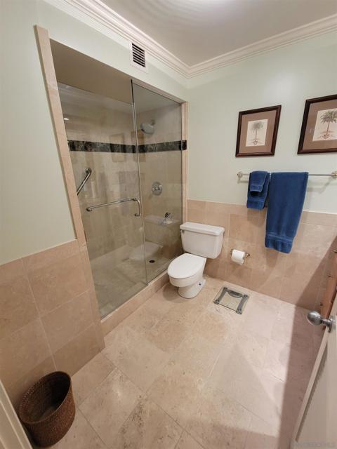 Very nicely appointed master bathroom.