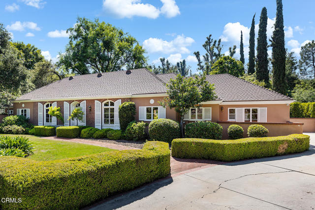 525 Laguna Road Pasadena, California This gorgeous French Provencial house on a vast 36,418 sq ft flat lot is a rare find. Located in the prestigious San Rafael neighborhood of Pasadena, this home is waiting for your personal touch. Enter the formal foyer into the large living room complete with built in bookcases, fireplace, crown moldings, high ceilings and large windows. The gracious dining room can host a large dinner party. The kitchen leads into a butler's pantry and sunroom overlooking the pool. The primary suite, 2nd bedroom and guest bath overlook a patio and the beautiful gardens. The 3rd bedroom and bath is perfect for an office or bedroom. A poolside guest suite with a bath and sauna completes the house. The lot is extensive with a pool, spa, patios, mature trees and gardens. The back yard is completely private. Possibilities abound with this lovely house and property.