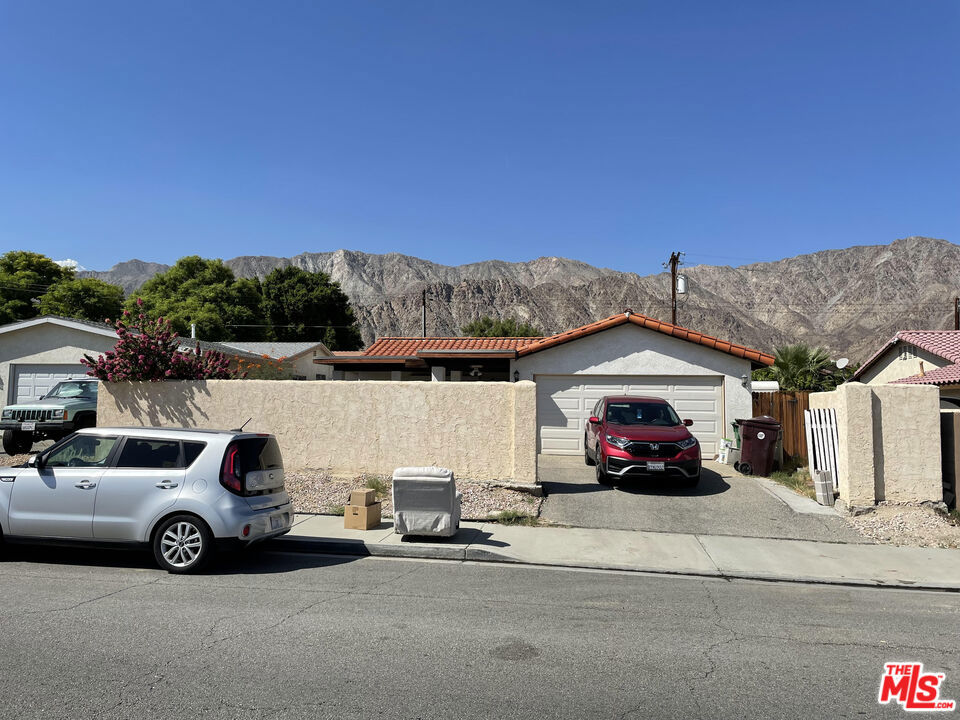 Welcome to the historic Cove area! This is a short-sale, fixer, but location is key here. 3 block-walk to Old Town La Quinta, featuring great restaurants and other amenities. Minutes drive to PGA West and many other golf courses. About 2 miles from the world tour Indian Wells Tennis Garden facility. This home is 3 blocks from a public school, close to a park, and about 5 blocks from the public library and City Hall. The home has 2 well-sized, on-suite, bedrooms with generous closets. Home has mountain-views both from the front yard and back patio. Home has indoor laundry, privacy wall at the front, attached 2 car garage with built-in cabinets, and pergolas in both the front and back. All terms and conditions subject to short sale lender approval.