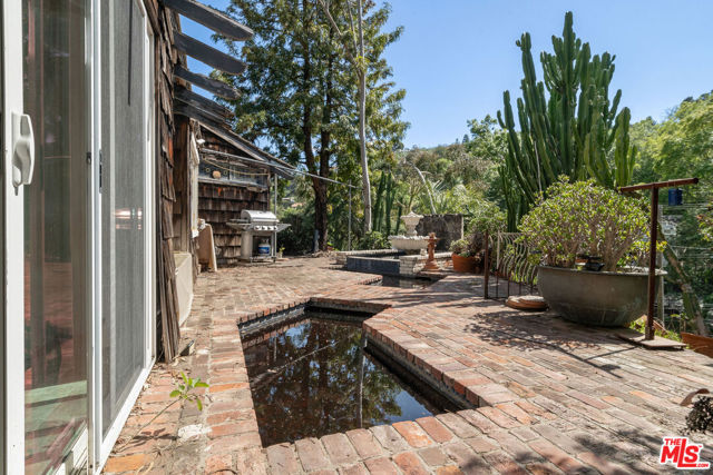 7319 Woodrow Wilson Drive, Los Angeles CA: https://media.crmls.org/mediaz/ece5b9d4-7da3-4cae-bc42-442ee809b409.jpg