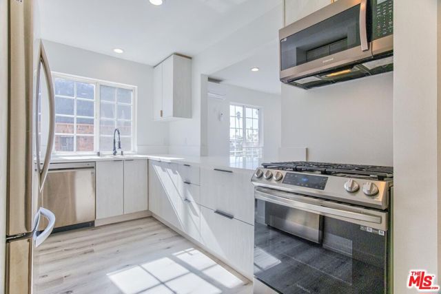 158 N Edgemont Street, Los Angeles CA: https://media.crmls.org/mediaz/ed76abc4-771a-4757-9d00-609b1ea1dd01.jpg