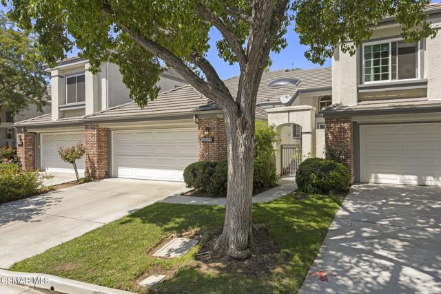 24408 Hampton Drive B Valencia, California Motivated sellers! Discover a life of refined luxury in the gated 'Stratford Collection' Townhomes within Santa Clarita's coveted Summit community. This stunning residence offers not one but two master suites, providing an exceptional blend of comfort and opulence. The remodeled eat-in kitchen, freshly painted and updated, boasts neutral cabinets, granite countertops, and stylish tile backsplash and flooring. An elegant dining area with hardwood floors, also freshly painted and updated, completes the picture. This unique split-level layout features the living area and one master suite on the lower floor, while the second master suite awaits upstairs. The living room impresses with hardwood floors, a dramatic fireplace, and soaring ceilings, creating a welcoming ambiance. Privacy is paramount with two separate master suites, one with hard wood floors, another with carpeting, both with walk-in closets, and spacious bathrooms with dual sinks. Modern amenities like wood blinds and contemporary ceiling fans add to the comfort.Outdoors, enjoy two private patios--a spacious front patio and a secluded back patio surrounded by greenery, accessible from both the master suite and living area. The Summit community offers a wealth of amenities, including pools, spas, tennis courts, playgrounds, illuminated trails, a clubhouse, and landscaping and trash services, ensuring a lifestyle of leisure and convenience. Embrace this extraordinary opportunity to live in style within the Summit's prestigious 'Stratford Collection' Townhomes.