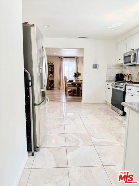 2940 Live Oak Street, Huntington Park CA: https://media.crmls.org/mediaz/ee34e4eb-04e2-4b36-a39d-684c9dbdb07f.jpg