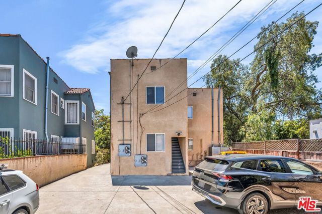 1073 S Mansfield Avenue, Los Angeles CA: https://media.crmls.org/mediaz/ee9c4df7-66b9-4209-ad0b-575dd6211540.jpg