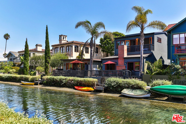 432 HOWLAND CANAL Venice, California Immaculate designer furnished lease on the exclusive Venice Canals. Gracious living & dining room with fireplace opens to a canal front deck with outdoor dining area. Chef's kitchen with stainless appliances, breakfast bar and large center island. Canal front Master suite with private balcony and beautiful master bathroom with double sinks, walk-in closet, steam shower & separate tub with water views. Two other bedrooms upstairs each with private balconies plus a 4th bedroom or office on the main level. Private rooftop sun deck with hot-tub and amazing views! Wired with Sonos music system throughout, alarm system with outdoor cameras, 2 car garage and private courtyard entry. Short term rate of $25,000/month. Available starting January 26, 2022.