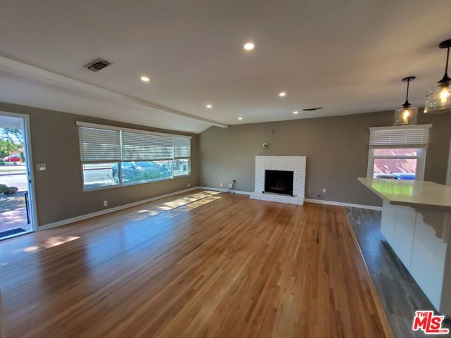 Living room w/ refinished HW floors