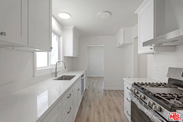 11119 S Denker Avenue, Los Angeles CA: https://media.crmls.org/mediaz/ef6c5a4a-0e9d-4737-9fb6-e658e9e3a3d0.jpg