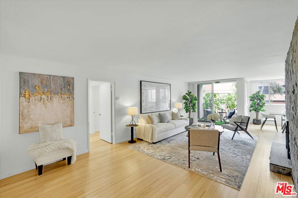 This spacious condo, nestled in the heart of Beverly Hills, offers a luxurious lifestyle with its prime location and ample amenities. It boasts 2 bedrooms plus a den and 2.5 bathrooms. Upon entering through the double doors, you're greeted by a large living room adorned with a gas fireplace, creating a cozy ambiance. The updated kitchen seamlessly connects to the dining room, making entertaining a breeze. Convenience is key with in-unit laundry, while the building itself provides a range of amenities, including a pool, spa, gym, and rec room. Additionally, the gated garage offers two tandem parking spaces and an on-site personal storage unit. Located on a picturesque palm tree-lined street, this condo is just blocks away from fine dining, luxury shopping, and the esteemed Beverly Hills school. Its highly desirable location and comfortable floor plan make it a must-see for those seeking the epitome of Beverly Hills living. First showing  Sunday, May 19th 2-5pm