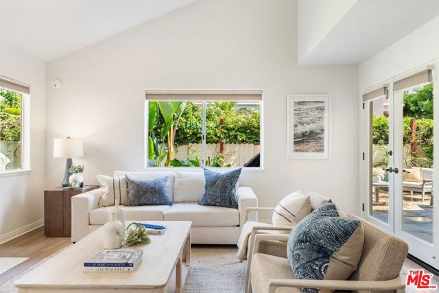 French doors from the living room lead to exterior patio