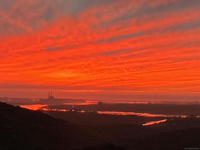 As you move from room to room the floor plan takes advantage of the view! And at night the distant lights seem calming. Even when there are no fires just scattering by the gas molecules that make up our atmosphere can produce a gorgeous bright red sunset!