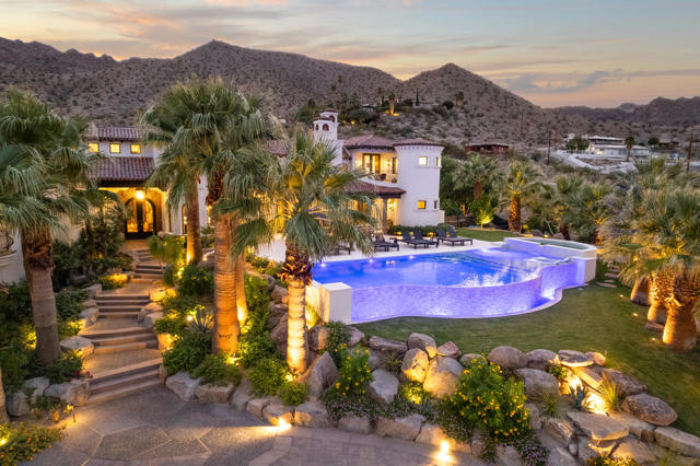 Unveil paradise in South Palm Desert, Cahuilla Hills. This stunning custom estate spans 6,254 sq ft, where every corner offers breathtaking panoramic vistas of majestic mountains and the picturesque valley below. This property location allows Short Term Rentals.