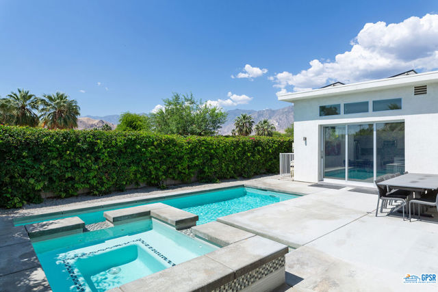 768 S California Avenue Palm Springs, California Enter a world of Modern Day design with Mid-Century flair. Polished concrete floors, tall ceilings, take you from the front entry past two guest bedrooms to the open living area. There is plenty of space for both a living area and dining area. The dining area will easily hold a table for eight while not losing an intimate feeling. The kitchen offers ample cabinetry for dishes or pots and pans with pull out drawers for ease of access. The Induction Wolf stove and Kitchen Aid appliances complete the modern lifestyle. The clear story windows let in the light and views. There are electric shades to soften the light when needed. A couple of recessed nooks are perfectly lit to accent your prized art. A large disappearing glass wall allows the inside lifestyle to flow out around the backyard in ground pool and separate spa. The yard is wrapped in large hedges, offering privacy while allowing you to enjoy the mountain views. There is patio access from the primary bedroom to the pool/spa area as well. The primary bedroom suite will easily accommodate a king-size bed while allowing room for a sitting area too. The primary bath has a large double vanity and oversized shower. The walk-in closet is double stacked for plenty of clothes. The two guest rooms share a Jack and Jill bath area. With 25 owned solar panels on the roof, the electric bill should be non-existant. There are walking paths, bicycle trails, parks, community tennis or public golf course only seconds away to enjoy. You are only minutes from downtown or the airport. Shopping is but moments away. Come take a look at what your lifestyle can be.