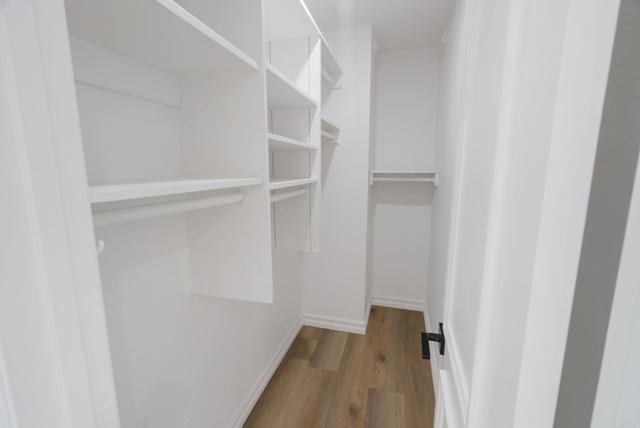 2nd Walk In Closet!  Generous Shelving & Hanging Rods for ALL of everything & MORE!