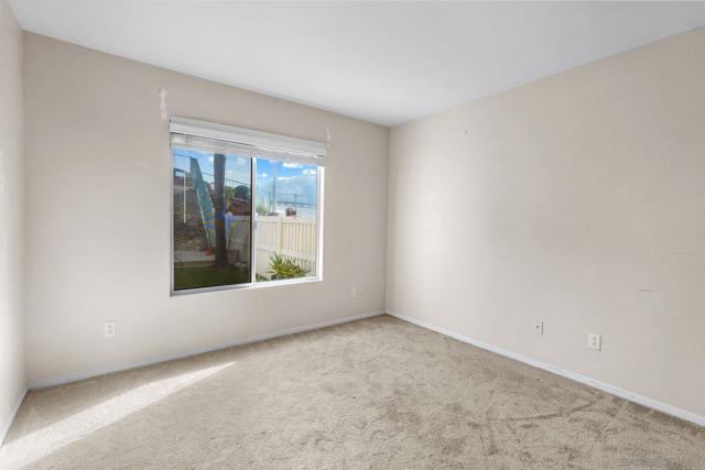 Yes!!! There is a lovely nice size downstairs bedroom!!! Use this room for mom, guest, office... its tucked around the corner for privacy peace and quiet.