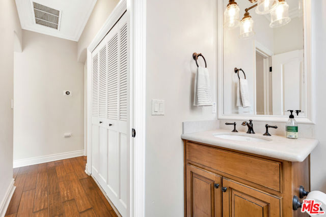 Guest bathroom and laundry side by side