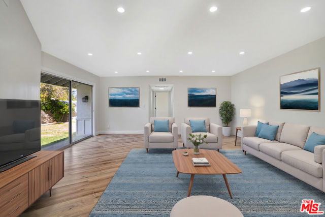 23153 Gonzales Drive, Woodland Hills CA: https://media.crmls.org/mediaz/f30162e7-1cc3-4f24-ab3c-57254e41d886.jpg