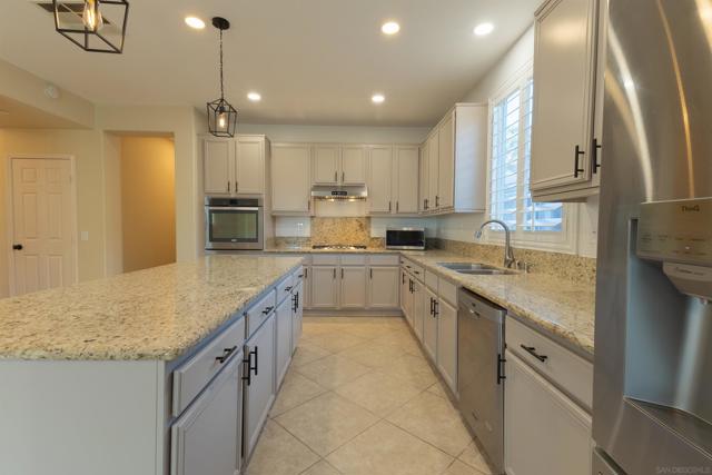 551 Dundee Ln, San Marcos CA: https://media.crmls.org/mediaz/f31d9d41-ecd3-4a4b-97c5-ac0f02937ca6.jpg