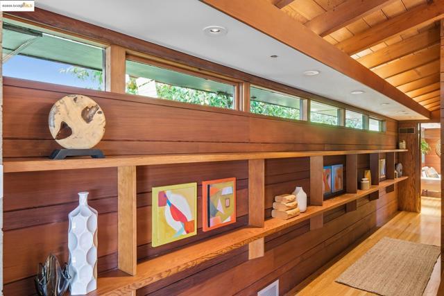 Detailed view of a sauna / steam room, recessed lighting, beam ceiling, and wood finished floors