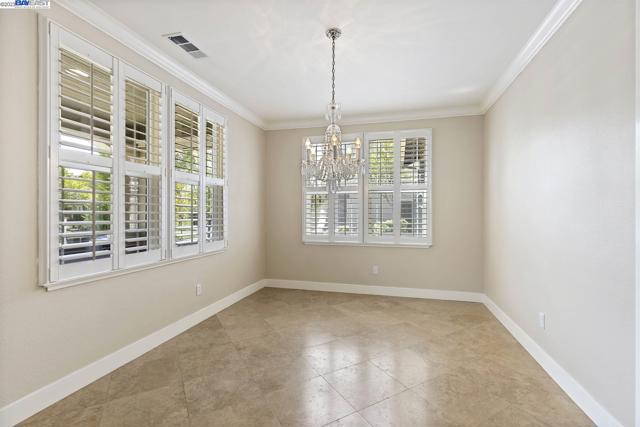 Travertine Tile & heirloom European Chandelier brought home during WW2