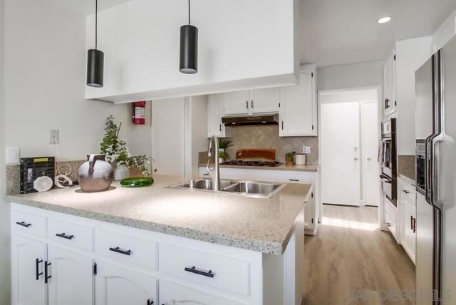 7296 Golfcrest Dr, San Diego CA: https://media.crmls.org/mediaz/f3c2306f-39ae-45a8-882f-1578a6530664.jpg