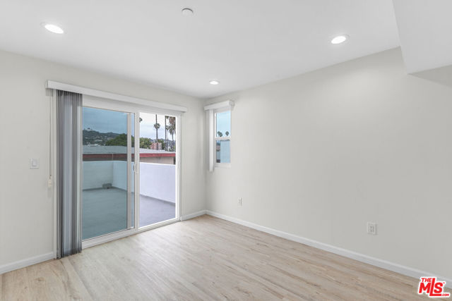 1409 N Hobart Boulevard, Los Angeles CA: https://media.crmls.org/mediaz/f4b1ef0c-30df-4a45-aca1-80aee138e29e.jpg