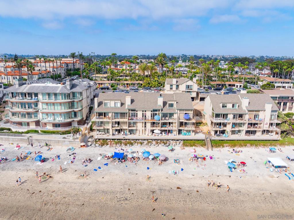 Oceanfront Views!! Fully Furnished! Private beach access! This corner unit beach condo is calling you home! Come live, play and relax in Carlsbad Village. This spacious 3 bedroom 2 bathroom home offers everything you need to make living at the beach easy.  In unit laundry, fully stocked kitchen and private balcony with ocean views. Walking distance to Carlsbad Village and downtown shops and dining. Assigned parking spot located across from unit. Guest parking available. Water and trash included in rent.   Pack your bags and come call this place home! Length of lease is negotiable with a minimum of 6 months. Enjoy the rest of 2024 beachfront!