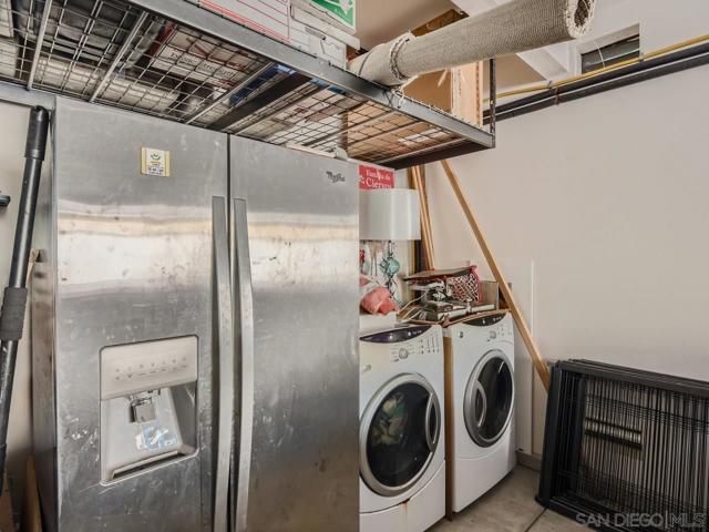 Laundry room in garage first floor.