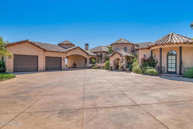 A beautiful home and property with a large Price Reduction - one of the lowest price per foot in the area.  https://2701vistaarroyodrive1803706.f8re.com/Website/Index#Come and enjoy this stunning estate located in the heart of Santa Rosa Valley. With 360-degree views this newly built custom home features large gathering areas with an open floor plan consisting of large windows and sliding doors providing a natural light atmosphere. Custom built in 2015 this Spanish style home features saltillo tile floors, and clay tile roofs, a large kitchen area for entertaining, indoor-outdoor living, and high ceilings. Other elements include warm and inviting patios, balconies, large fireplaces, courtyard, water fountains, iron fixtures, rustic wood floors, trim and exposed beams. With 7000+ sq feet this estate provides plenty of room for entertainment and living. Consisting of a large kitchen and nook, pantry, five bedrooms, living room, great room, dining room, media room, attached mother-in-law quarters, office, upper deck, loft area, side covered patio, back covered patio, entrance courtyard, six bathrooms, carport and two car garage. Located on four acres of land with a large backyard, side yard with storage sheds, an avocado orchard, mature vegetation, garden area, fruit trees, and a variety of shade trees. Beautiful driveway lined with large pepper trees provides estate privacy. Plenty of parking for friends and special events. Property is also zoned for additional building(s) such as a barn or workshop.