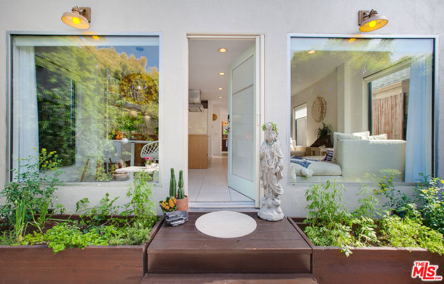 330 Venice Way Venice, California Artist-owned sanctuary with stunning modern design in the heart of Venice, blocks from the beach, Venice Canals and famed Abbot Kinney Boulevard. This architectural gem and landscaped Zen Garden evoke a sense of awe. Enter the bright, airy open floor plan where floor-to-ceiling steel core windows frame the outdoors. The chef's kitchen features top of the line appliances including Miele cooktop/oven and dishwasher, SubZero refrigerator, Poliform range hood + pantry. One private bedroom on first floor with walk in closet; a floating staircase leads to the main bedroom suite with wrap around viewing balcony. The high ceilings optimize space & light and there's a large walk in closet and a fully remodeled en suite bathroom with glass & tile shower. A 3rd en-suite bedroom with private balcony can be used as a creative studio or office. Additionally, the house features dual zoned a/c, security camera/lights, Beyond o2 alkaline water filtration system, on-demand water heater, electronic entry system, additional parking in driveway for several cars. A few blocks in any direction are sand and surf, dine, Abbot Kinney bars, restaurants and retail and the wondrous canals. Venice is home to artists, writers, musicians drawn here for the history, the eclectic lifestyle and the California vibe. Here, you too can create your dream - visualize yourself enjoying sunsets from your rooftop where you can take in the ocean, city and mountain views; or, if you'd like, create for yourself an income producing investment.