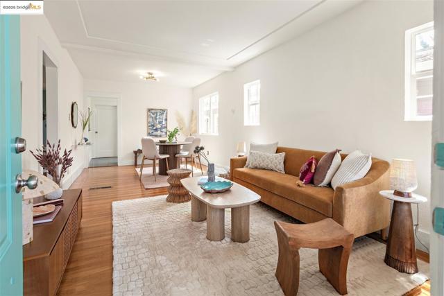 Living room with light wood-style floors