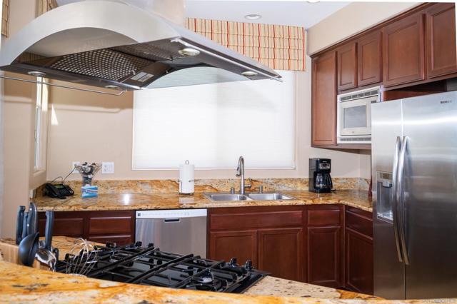 Granite countertops, gas range and miles of non-stop views!