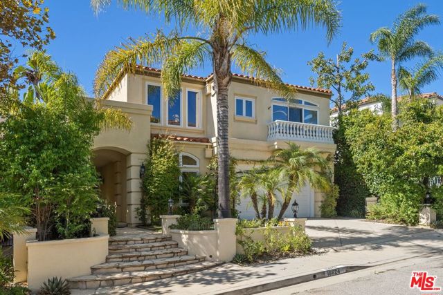 16624 Calle Arbolada Pacific Palisades, California MUST SEE IN PERSON TO APPRECIATE THE GORGEOUS PANORAMIC OCEAN AND MOUNTAIN VIEWS FROM DOWNSTAIRS AND UPSTAIRS. This spacious light filled home boasts 3,361 square feet. There is a formal entry and a step down living room featuring a fireplace and 2-story ceiling. Formal dining area also features a two story ceiling and French doors that open to good size yard perfect for entertaining. Remodeled kitchen features a breakfast bar, Caesarstone countertops, tiled backsplash, recessed lighting and stainless steel appliances. It opens to generous breakfast area plus family room with fireplace, built-in cabinets and ceiling speakers. Renovated downstairs bathroom features a shower and bidet/washlet. Fourth bedroom downstairs currently used as an office with automated window shade for privacy. A grand spiral staircase leads to a master suite with fireplace, sitting area, and five new casement windows with automated shades. Master bathroom has double sinks, large spa tub, vanity, and automated window shades. There are two additional bedrooms suites, one with new cabinetry and a Japanese door leading to a sunny office with built-ins. Laundry room is conveniently located upstairs. This special home has hardwood floors, Nest thermostats and security cameras throughout. Attached three-car garage with direct entry has built-ins for storage. WHO NEEDS ELECTRICAL BILLS? HOW ABOUT $5 MONTHLY? Twenty-five new high-end LG solar panels, owned and installed in 2020, along with a new 200-amp electrical service panel plus Tesla Powerwall batteries for whole-home backup to erase electrical bills. Water heater and garage door and opener replaced in 2016. Tile roof mostly replaced in 2020. Yards feature natural stone, fountains, pergolas, BBQ and gardens plus mature hedges for privacy. Private gated park with playground, and another private giant Highlands Park with huge grass field, walking/jogging path, play area and off-leash dog hours. Enjoy membership to the Summit Club with pool, spa, gym, tennis, basketball and playground. Live your dream life, where the mountains meet the sea.
