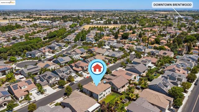 View of property location with nearby suburban area