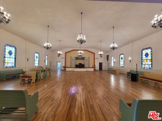 20 ft ceilings, refinished wood flooring